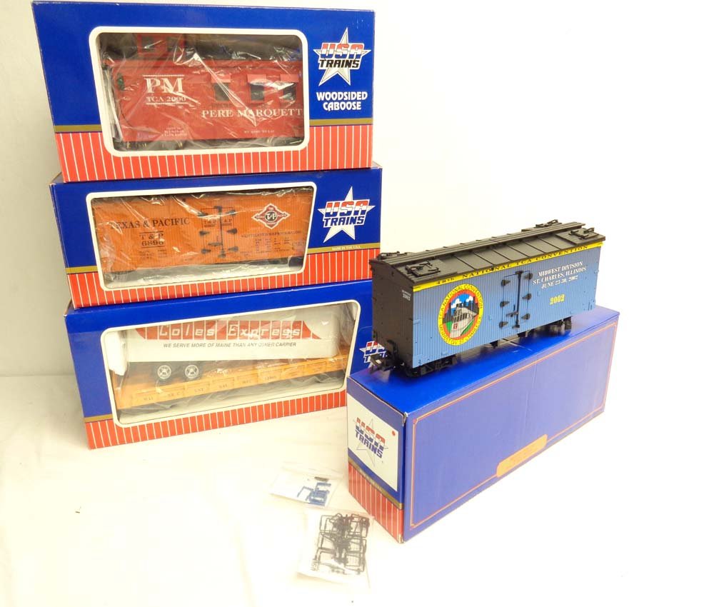 ABT: USA Trains G Gauge: 4 Assorted Cars/OBs: Paul V. Ambrose and Drew J. Bauer present: These are the Texas & Pacific Refrigerator Car, the PM Caboose, the Coles Express Flat Car, and the TCA 2002 National Convention Box Car that USA Trains made