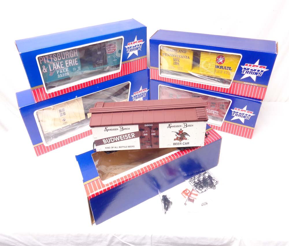 ABT: Mint USA Trains G Gauge: 5 Assorted Cars/OBs: Paul V. Ambrose and Drew J. Bauer present: These are the Illinois Central Bunk Car, the CSD Hooch Caboose, the Pittsburgh and Lake Erie Box Car, the Maryland and Pennsylvania Box Car, and the Anhauser