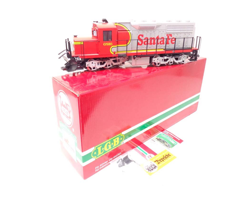 ABT: Mint LGB G Scale: #22560 Santa Fe D&RGW Diesel/OB: Paul V. Ambrose and Drew J. Bauer present: This is the #22560 Santa Fe D&RGW Diesel that LGB made for G Scale a few years ago. Our Opinion is that it is generally in Mint Condition. Original Box. All