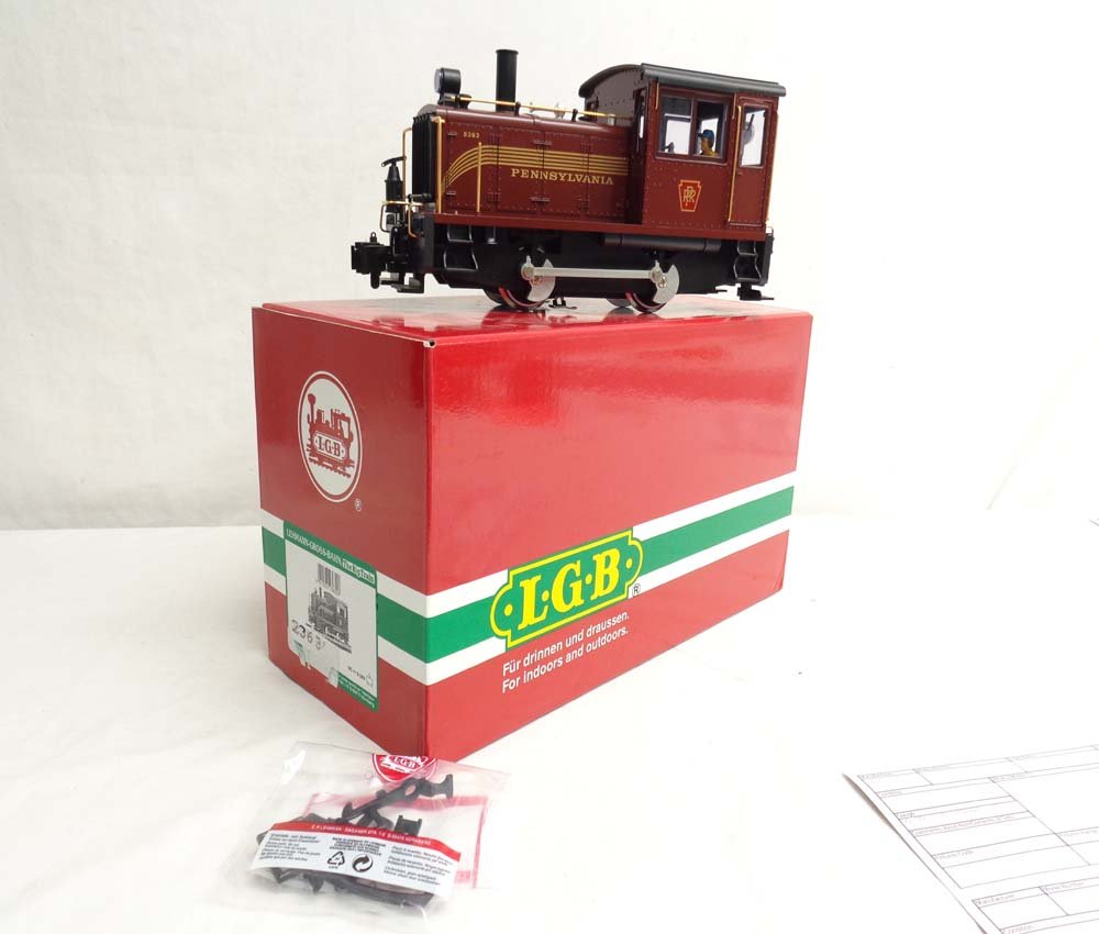 ABT: Mint LGB G Scale: #2363 Pennsylvania Locomotive/OB: Paul V. Ambrose and Drew J. Bauer present: This is the #2363 Pennsylvania Locomotive that LGB made for G Scale a few years ago. Our Opinion is that it is generally in Mint Condition. Original Box. All