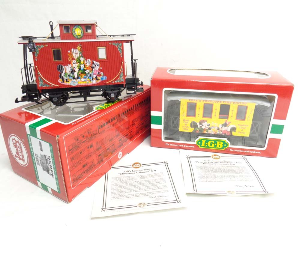 ABT: Mint LGB G Scale: #44656 Christmas Caboose and: Paul V. Ambrose and Drew J. Bauer present: These are the #44656 Christmas Caboose and the #35065 Dining Car that LGB made for G Scale a few years ago. Our Opinion is that they are generally in Mint Co
