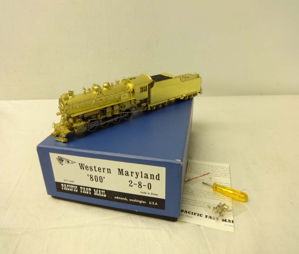 ABT: Brass HO: PFM Western Maryland 2-8-0 Steam E&T/OB: Paul V. Ambrose and Drew J. Bauer present: These are the HO Brass Western Maryland '800' 2-8-0 Steam Engine and Tender that Pacific Fast Mail made in Korea circa 1970. Includes OB and Miscellany as sh