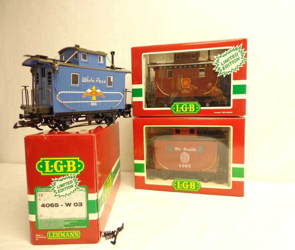 ABT: LGB G Scale: #4065-W03/4065-E03/4065 Cabooses/OBs: Paul V. Ambrose and Drew J. Bauer present: These are the #4065-W03/4065-E03/4065 Cabooses that LGB made for G Scale a few years ago. Our Opinion is that they are generally in Like New Condition. Origi