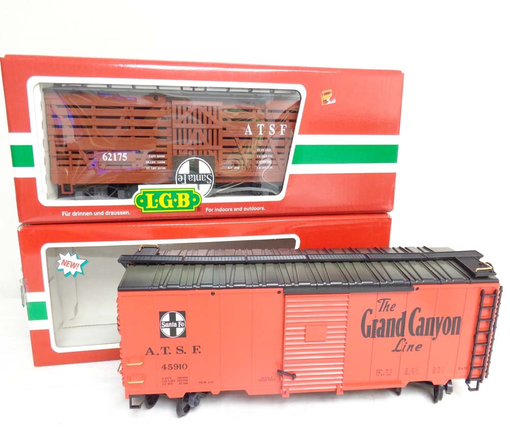 ABT: Mint LGB G Scale: #45910 Santa Fe Box Car and: Paul V. Ambrose and Drew J. Bauer present: These are the #45910 Santa Fe Box Car and the #46680 ATSF Livestock Car that LGB made for G Scale a few years ago. Our Opinion is that they are generally in
