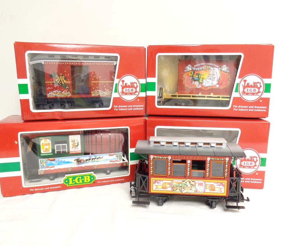 ABT: Mint LGB G Scale: #44030/31420/34130/31050: Paul V. Ambrose and Drew J. Bauer present: These are the Christmas #44030 Flat Car with Container, the #31420 Barrel Car, the #34130 Passenger Car, and the #31050 Box Car that LGB made for G Scale a f