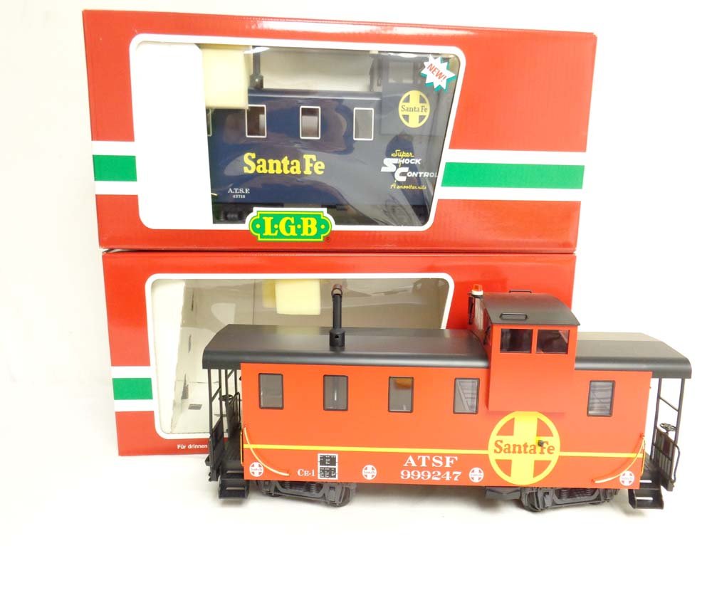 ABT: Mint LGB G Scale: #43710/43714 Santa Fe: Paul V. Ambrose and Drew J. Bauer present: These are the #43710/43714 Santa Fe Cabooses that LGB made for G Scale a few years ago. Our Opinion is that they are generally in Mint Condition. Original Bo