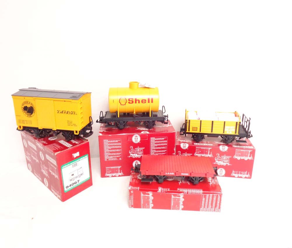 ABT: Mint LGB G Scale: #94280/94067/94060/94016: Paul V. Ambrose and Drew J. Bauer present: These are the #94280 Shell Tank Car, the #94067 Lake George and Boulder Box Car, the #94060 Box Car, and the #94016 Gondola with Barrels that LGB made for G