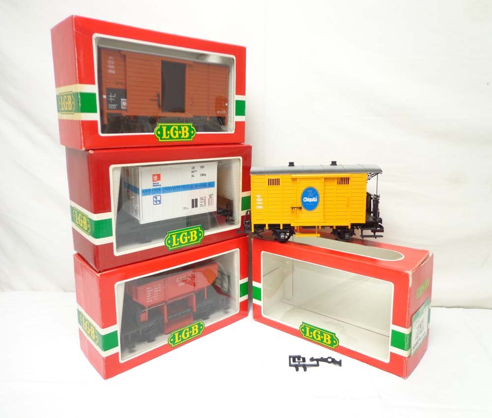 ABT: Mint LGB G Scale: #4041/4033/4003/4035 Assorted: Paul V. Ambrose and Drew J. Bauer present: These are the #4041 Dump Car, the #4033 Chiquita Banana Caboose, the and the #4003 Flat Car with Load, #4035 Box Car that LGB made in G Scale a few years ago