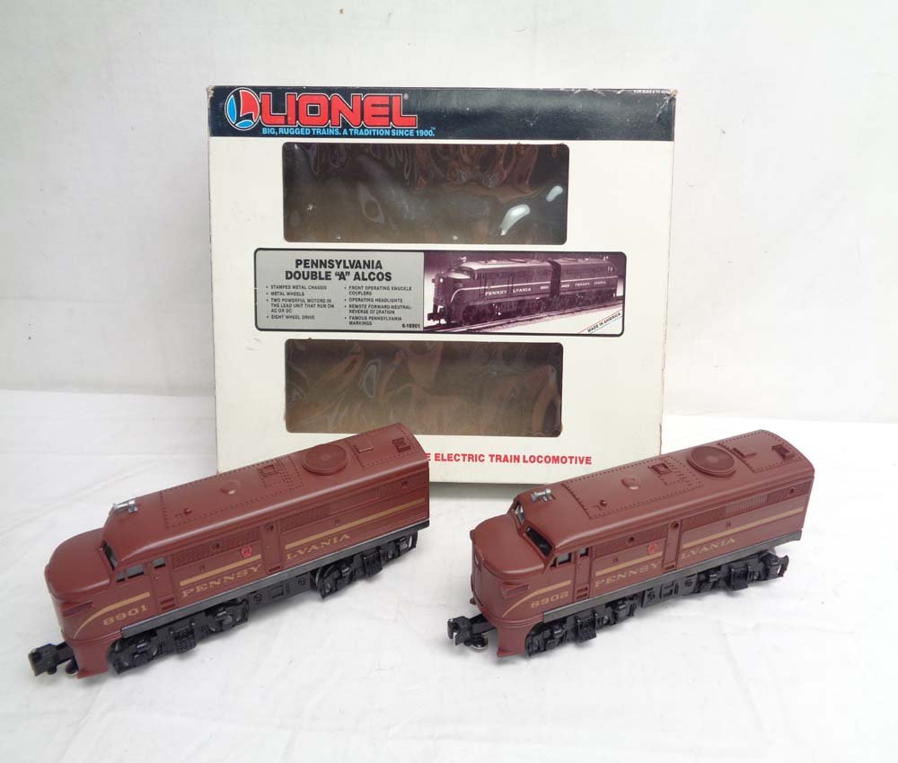 ABT: Lionel #18901 Pennsylvania Alco AA Diesel/OB: Paul V. Ambrose and Drew J. Bauer present: These are the #18901 Pennsylvania Alco AA (Powered and Non-Powered) Diesels that Lionel made a few years ago. Our Opinion is that they are generally in Like 