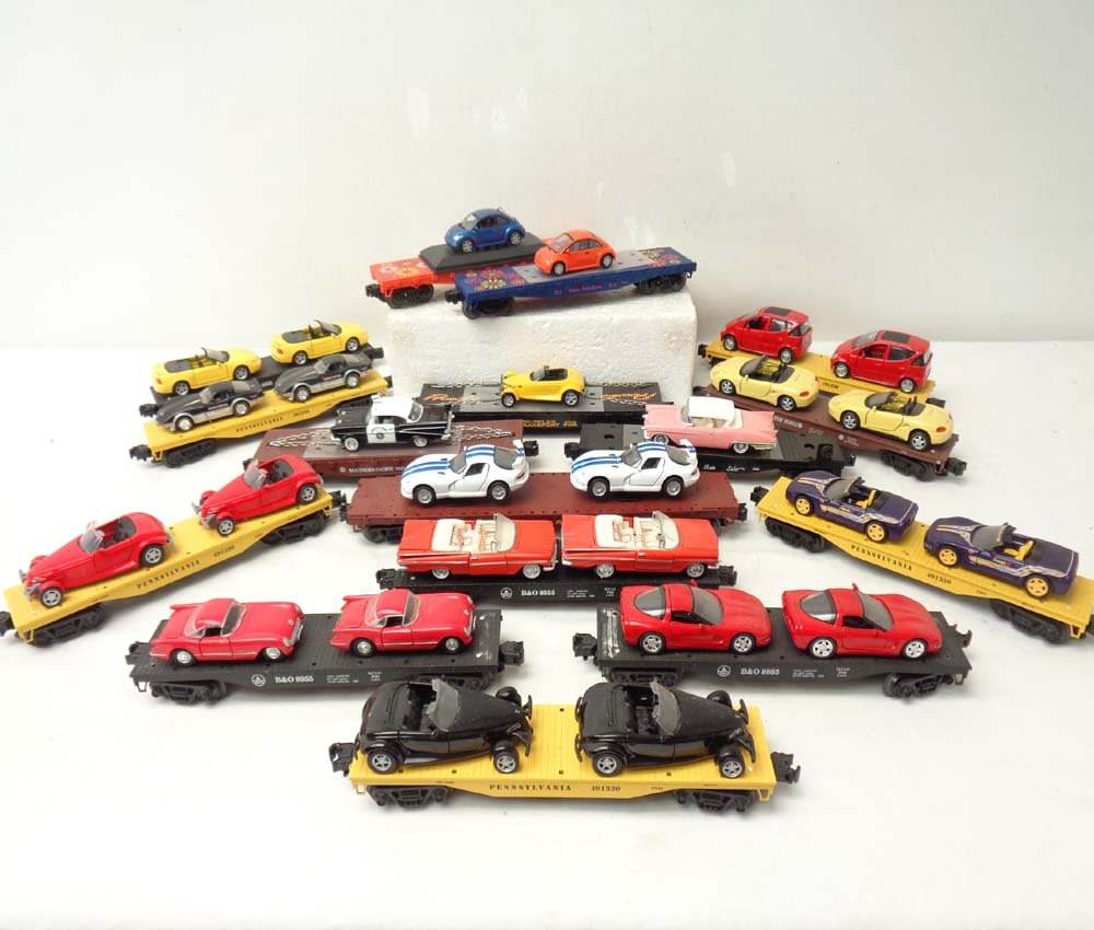 ABT: 16 Assorted MTH/Lionel Flat Cars with Vehicles: Paul V. Ambrose and Drew J. Bauer present: These are sixteen Assorted Flat Cars with Vehicles (some have screw into bottom of cars) that MTH/Lionel made a few years ago. No Boxes. Please add $40.00 fo