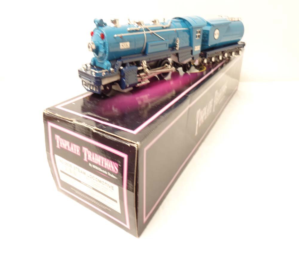 ABT: MTH #10-1062-0 No. 263E Steam Locomotive/Tender: Paul V. Ambrose and Drew J. Bauer present: These are the #10-1062-0 No. 263E Steam Locomotive/Tender Blue Comet Blue w/Nickel Trim that MTH made in O Gauge circa 1999. Our Opinion is that they are gen