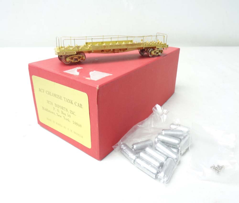 ABT: Brass HO: MTS ACF Chlorine Tank Car/OB: Paul V. Ambrose and Drew J. Bauer present: This is the unpainted Brass HO AFC Chlorine Tank Car that MTS Imports/FM Models made some time in the past Includes OB as shown. Examine very closely; what i