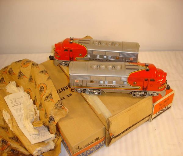 ABT: Great Lionel #2333 High-Decal Santa Fe F-3 AA: Paul V. Ambrose and Drew J. Bauer present: These are the #2333 Santa Fe F-3 AA Diesels with Dual Motors and Horn that Lionel made in 1948/49. This is the rare variation with high-positioned, Red GM De