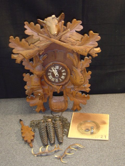 BLACK FOREST CUCKOO COO COO HUNTER/STAG CLOCK: MUSICAL PLAYS EMPEROR WALTZ BY THORENS. THE CLOCK MOV'T IS MARKED W. GERMANY. SELLING FOR PARTS OR MAJOR RESTORATION. NEEDS SOME TLC. NO IDEA IF IT COULD BE MADE TO WORK OR FOR HOW LONG IT MIGHT IF YO