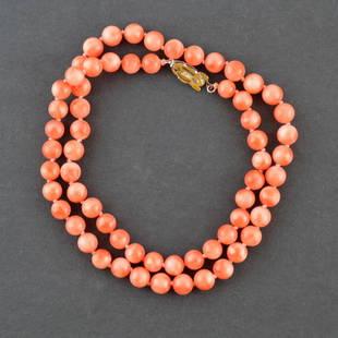 Natural Coral Bead Necklace: A strand of natural coral beads 0 H W L Weight