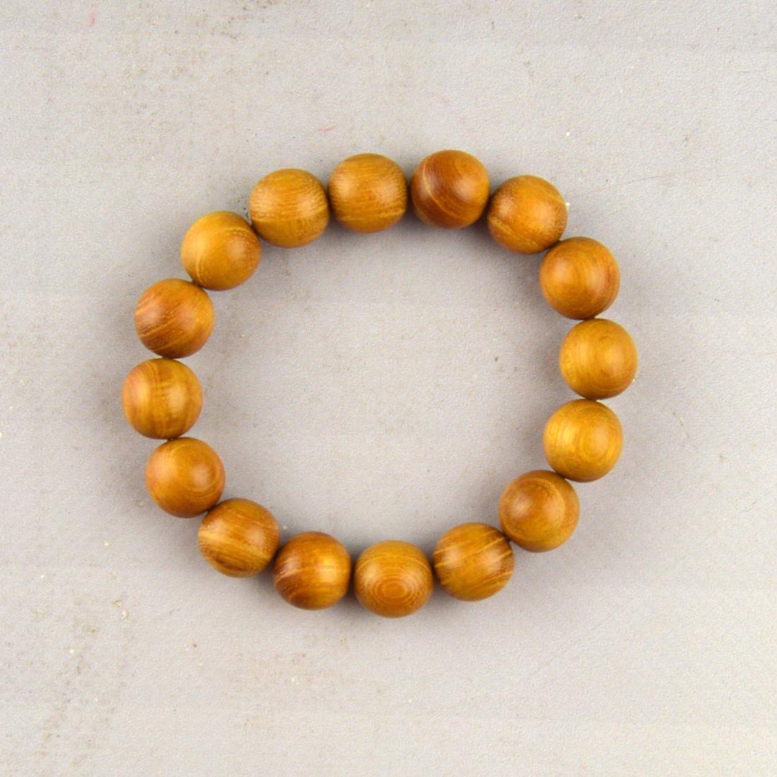 Chinese Mulberry Wood Bead Bracelet: A set of wooden beads strung into a bracelet made from chinese mulberry or "zhe" wood.;Heightx ;Widthx12;Lengthx;Weightx