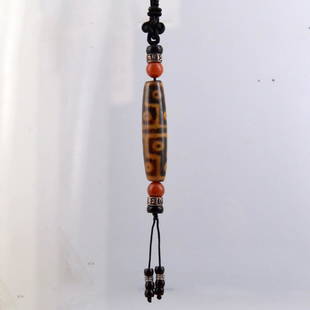 Twelve-Eyed Dzi Bead Pendant Necklace: 十二眼天珠項鍊 A single dzi bead pendant with twelve eyes and decorative beads on a woven necklace. Sizing: 55; Weight: 27