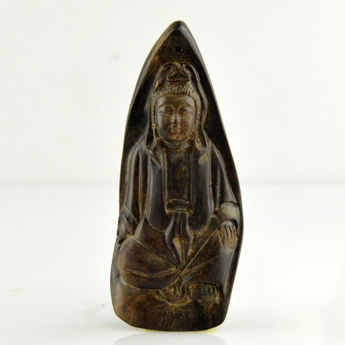 Natural Incense Wood Pendant: 天然沉香吊飾 A natural 'incense' or 'chenxiang' wood carved Guanyin pendant. Weight: 20