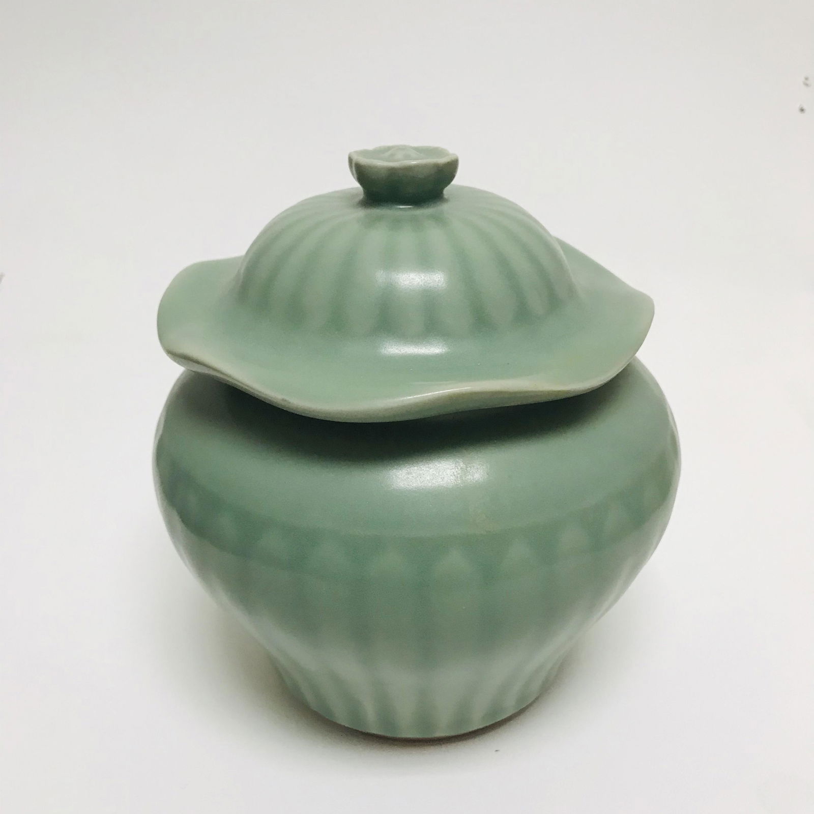 Old celadon lotus leaf cap (1 of 3)