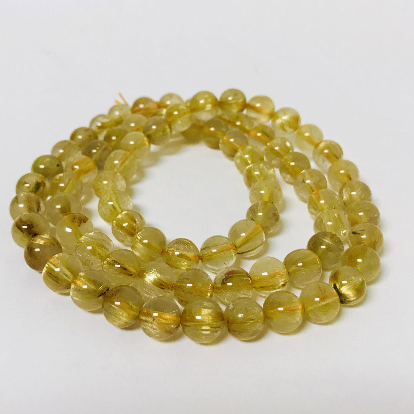 Natural Brazil titanium crystal chain has a: Natural Brazil titanium crystal chain has a certificate.7.5mm-8mm