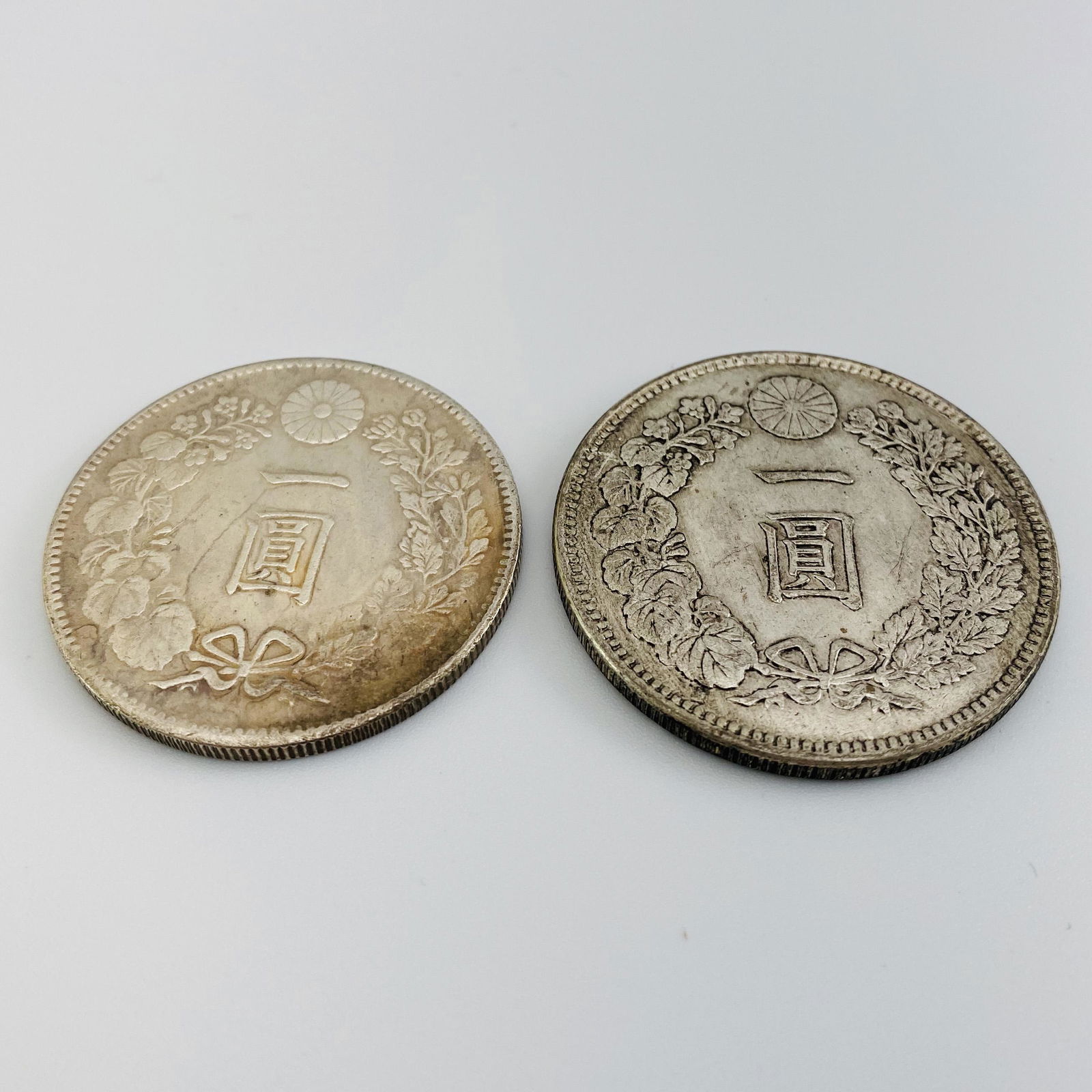 Pair of Dragon Silver Coins (1 of 2)