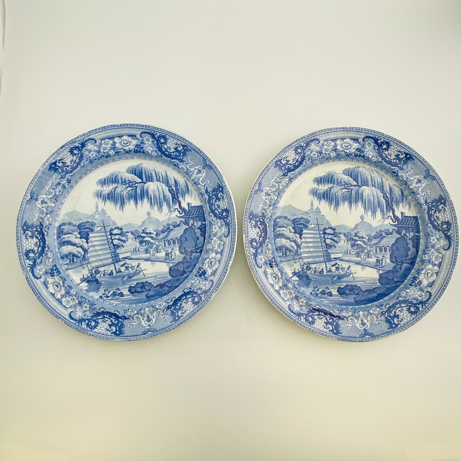 A Set of Two Blue and White Porcelain Plates with: A Set of Two Blue and White Porcelain Plates with Figures and Landscapes. 25*25*2cm