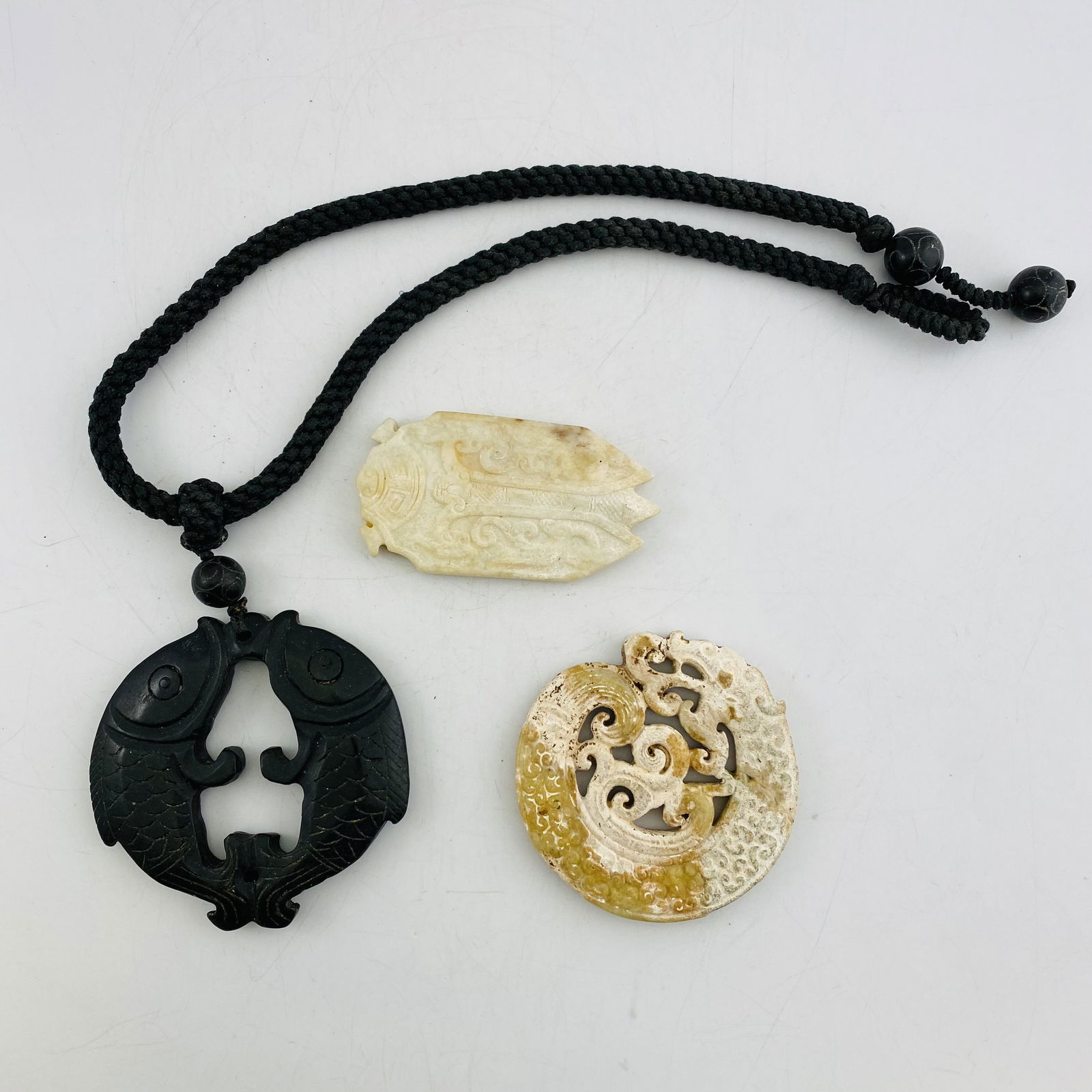 A Set of Three Old Jade Pieces (1 of 7)