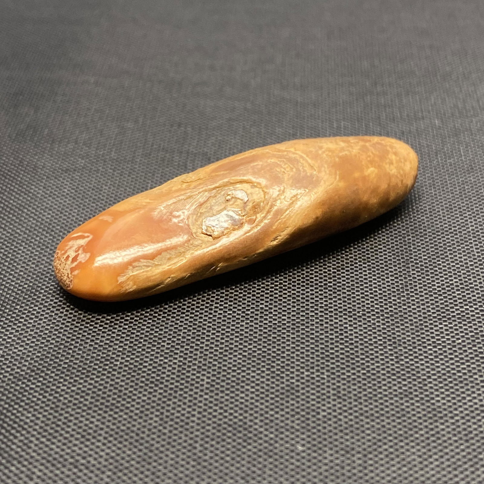 A Piece of Sabertooth Tiger Tooth: A Piece of Sabertooth Tiger Tooth. 4.9*1.7*1.1cm