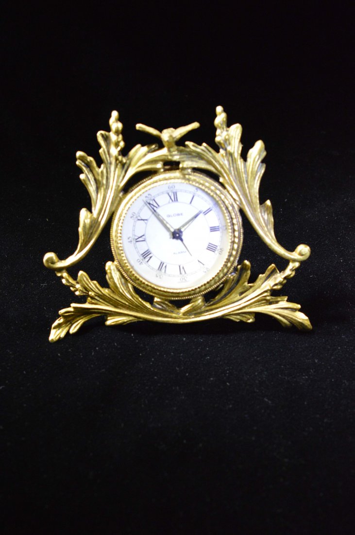 Vintage Table Clock: A beautifully elegant gilt table clock.