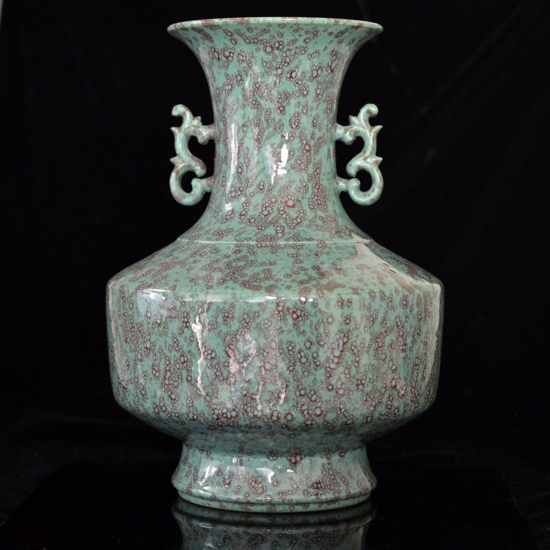 Lu Jun Glazed Double-Handled Porcelain Vase: 爐鈞釉撇口雙耳瓶A vase made of porcelain with Lu Jun Glaze; double-handled; ------ D x 7.750" H x 11.375"