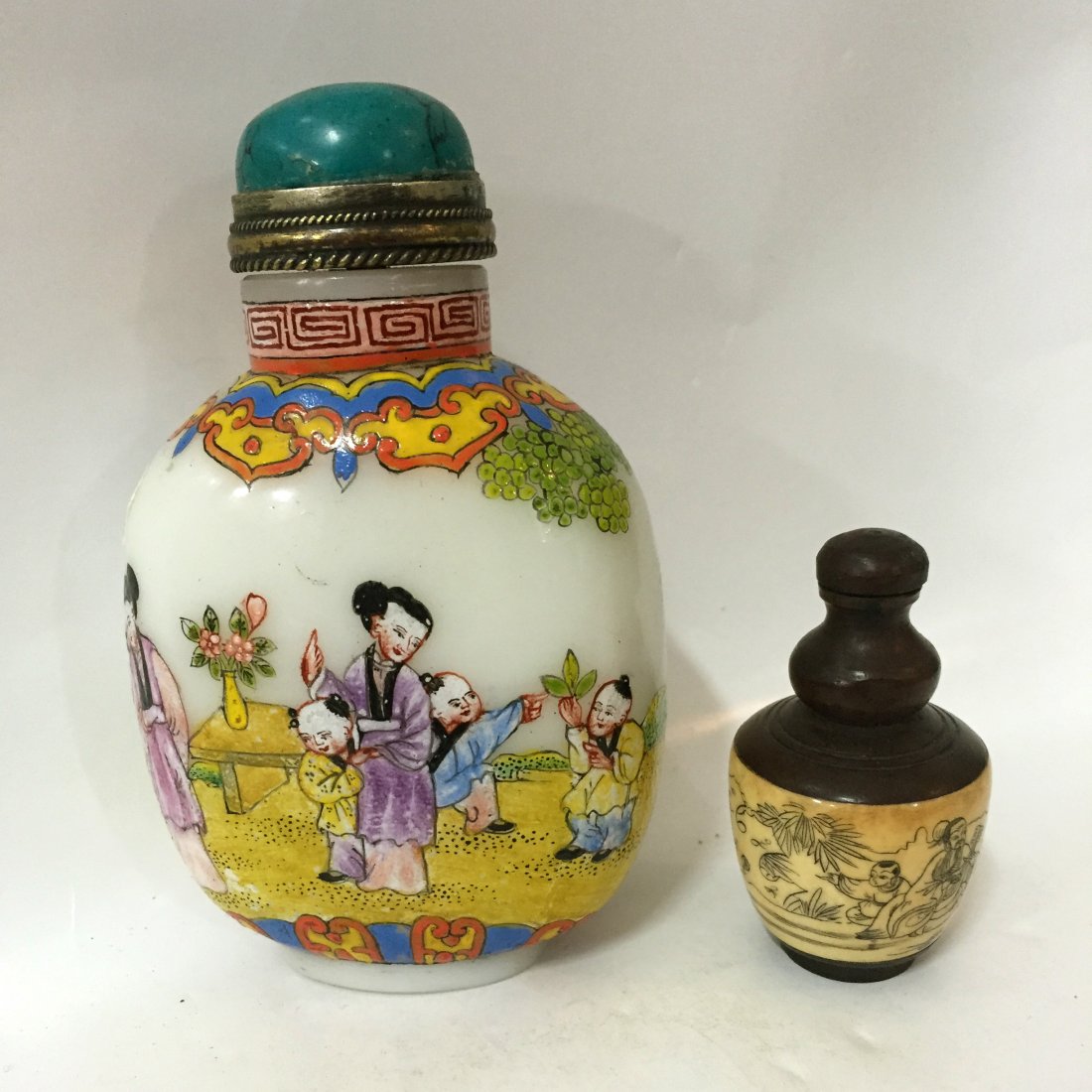 Wood Body W/Bone Carve Snuff Bottle + Marked Liuli: A set of 2 snuff bottles; one Wood body with bone Carve embedded face snuff bottle depicting An old man is playing Chinese lute with a kid playing around him (A); one large snuff bottle made of Liuli 