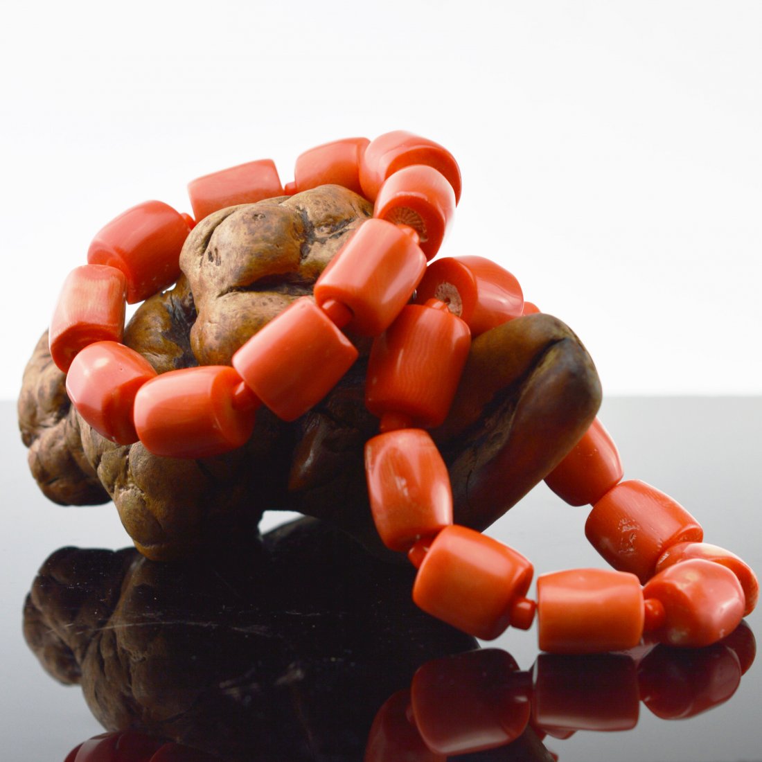 Pair of Coral Barrel Bead Bracelets: A pair of bracelets made of coral barrel beads; ------ Each approx. Inner D x 2.250" Outer D x 3.375" 104.600g