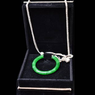 Certified Natural Jadeite Pendant w/Silver Necklace: A pendant made of natural jadeite in a ring shape; attached with a necklace made of silver; certified by American International Gemological Laboratories, Inc. Cert.No.WI83707; ------