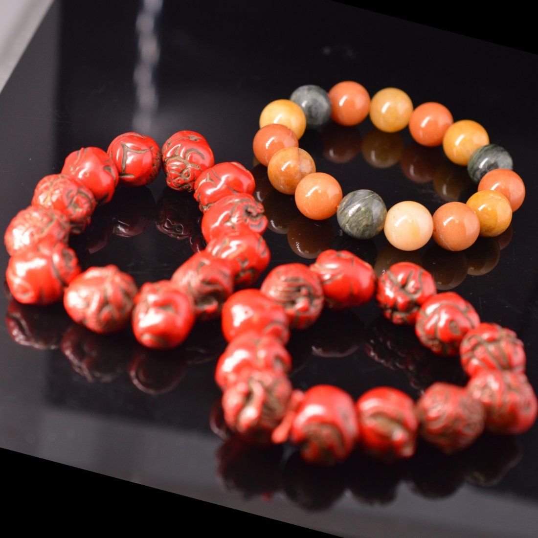 Pair of Cinnabar Lacquer Bead Carved Bracelets + (1 of 3)