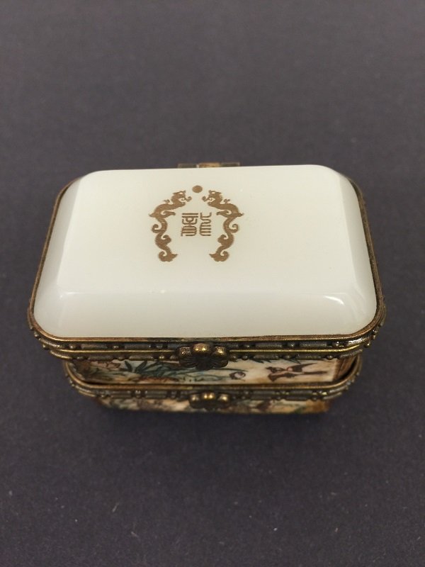 Antique Carved Bone Jewelry Box Inlaid Jade: Antique Qing nicely carved bone jewelry box reinforced by gilt metal and inlaid white jade on cover, there are carved flowers and birds on bone box with letter dragon on white jade. Dimension: H 5.00c