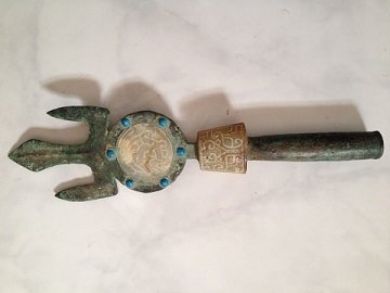 Antique Bronze Spear Head Inlaid Jades: An ancient Bronze Spear Head Inlaid 2 Jades, Round shape jade,Diameter 5cm,has finely carved original dragon totem. There are 12 turquoises on edging bronze of both sides surround by round shape jade.