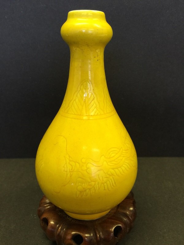 Qing Carved Dragon Glazed Yellow Porcelain Vase: A finely carved dragon glazed yellow porcelain vase with beautiful shape, there is Da Qing Yongzheng Nian Zhi Mark on bottom. Dimension: H 14cm; Diameter of Bottom: 4cm.