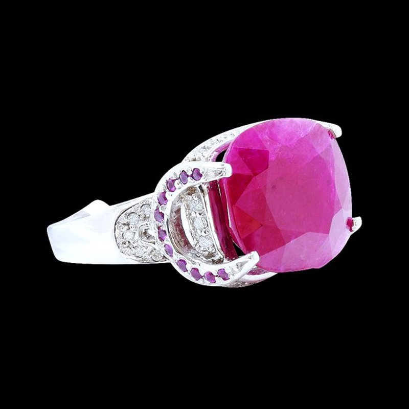 Nicely 14K White Gold Ring Inlaid 15.53CT Natural Ruby: A nicely 14K white gold ring inlaid finely carved 15.53CT natural ruby and diamond. < Specification:WEIGHT:8.74GRAMS. Ruby(Mainstone):15.53CT. Ruby(Sidestone):0.51CT. Diamond:0.42CT. Appraised Retail
