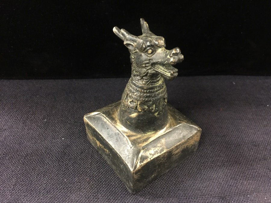 A Finely Carved Archaic Bronze Dragon Handle Seal (1 of 3)