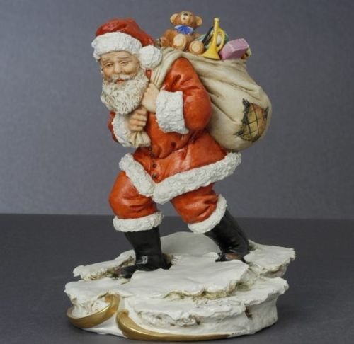 Santa Claus Capodimonte Porcelain MADE IN ITALY: Made in ItalyCapodimonte hand painted porcelain figureBy Scapinello WalterThe best certificate of authenticity for Capodimonte is the trade mark of the House of Capodimonte sealed into the piece under