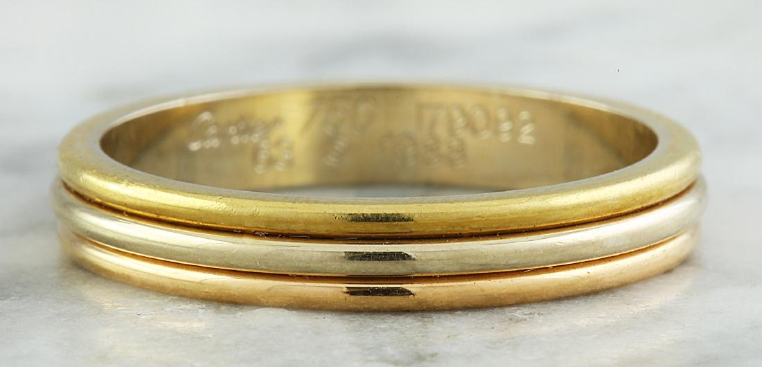 Authentic Cartier 18K Multi-Tone Gold Ring: Stamped: 750 Total Ring Weight: 5.8 Grams Face Measures: 3.88 Millimeter SKU: [600482]