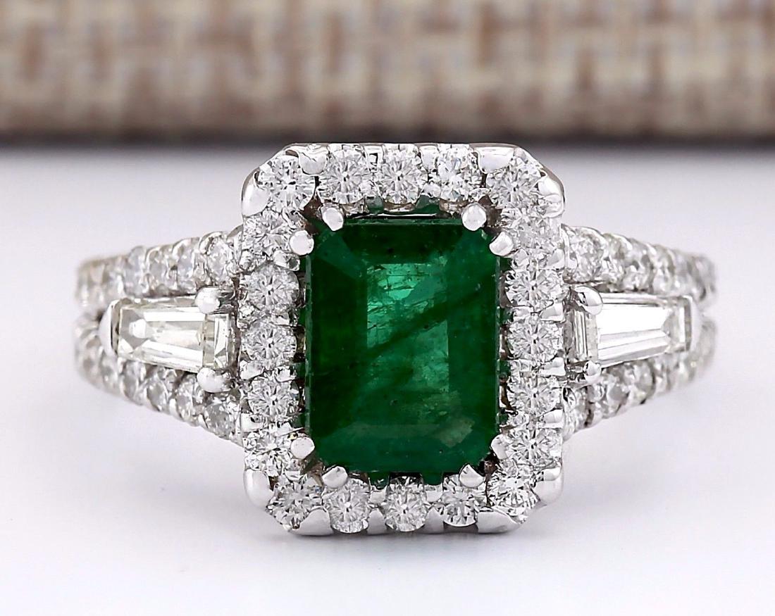 3.30 CTW Natural Emerald And Diamond Ring In 18K White: Stamped: 18K Ring Size: 6.25 Total Ring Weight: 7.5 Grams Diamond Weight: Total natural diamond weight is 1.50carat. VS2-SI1 clarity / F-G color Gemstone Weight: Total Natural Emerald Weight is 1.80ct