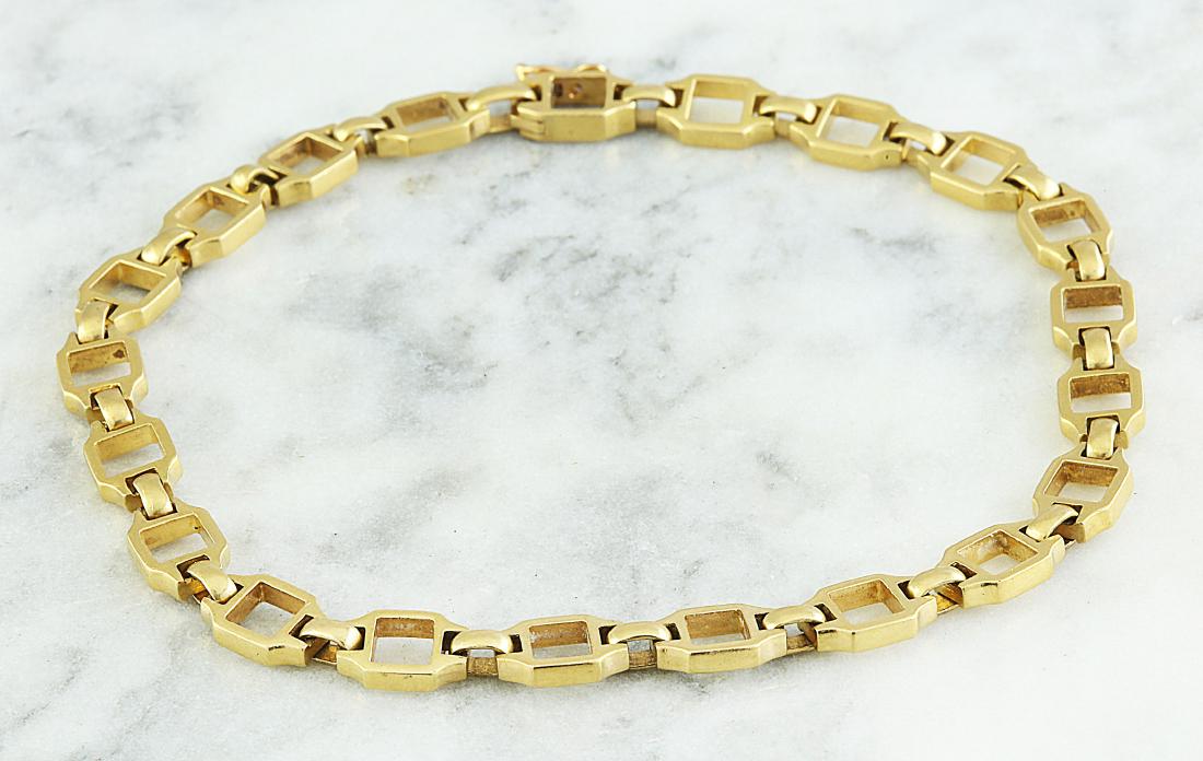 Authentic Cartier 18K Yellow Gold Bracelet: Stamped: 750 Total Bracelet Weight: 12.00 Grams Bracelet Length: 7.5 Inches Face Measures: 5.35 Millimeters SKU: [600588]