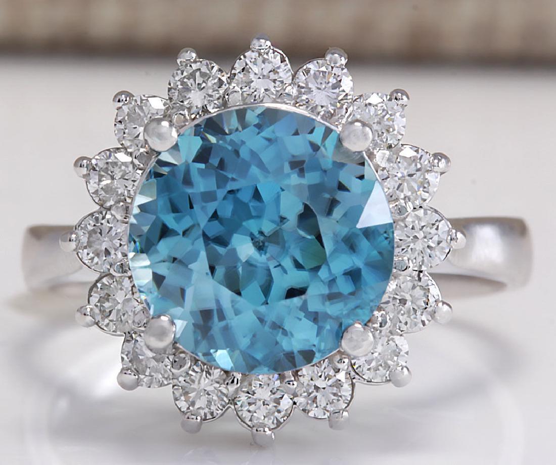 5.72CTW Natural Zircon And Diamond Ring 18K Solid White: Stamped: 18K Ring Size: 6.5 Total Ring Weight: 4.8 Grams Diamond Weight: Total natural diamond weight is .70carat. VS2-SI1 clarity / F-G color Natural Zircon Weight is 5.02ctw (Measures: 9.72x9.58mm) 