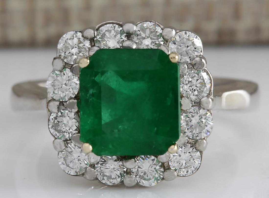 3.15CTW Natural Colombian Emerald And Diamond Ring In: Stamped: 18K Ring Size: 6.25 Total Ring Weight: 6 Grams Diamond Weight: Total natural diamond weight is .85carat. VS2-SI1 clarity / F-G color Gemstone Weight: Total Natural Emerald Weight is 2.30ctw (