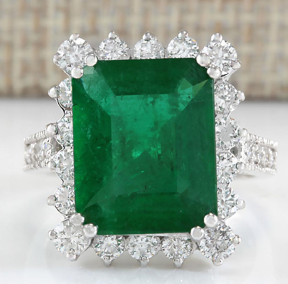 6.94CTW Natural Colombian Emerald And Diamond Ring In: Stamped: 18K Ring Size: 7 Total Ring Weight: 8.3 Grams Diamond Weight: Total natural diamond weight is 1.50carat. VS2-SI1 clarity / F-G color Gemstone Weight: Total Natural Emerald Weight is 5.44ctw (