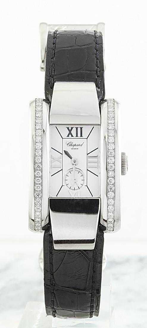 Authentic Chopard La Strada Diamond Watch: ConditionGoodModelLa StradaGenderLadiesReference #41/8357DialWhiteCase MaterialStainless SteelCase Size24 mmBezelStainless Steel & DiamondsBandLeatherWrist SizeAdjustableClaspBuckleClasp MaterialStain