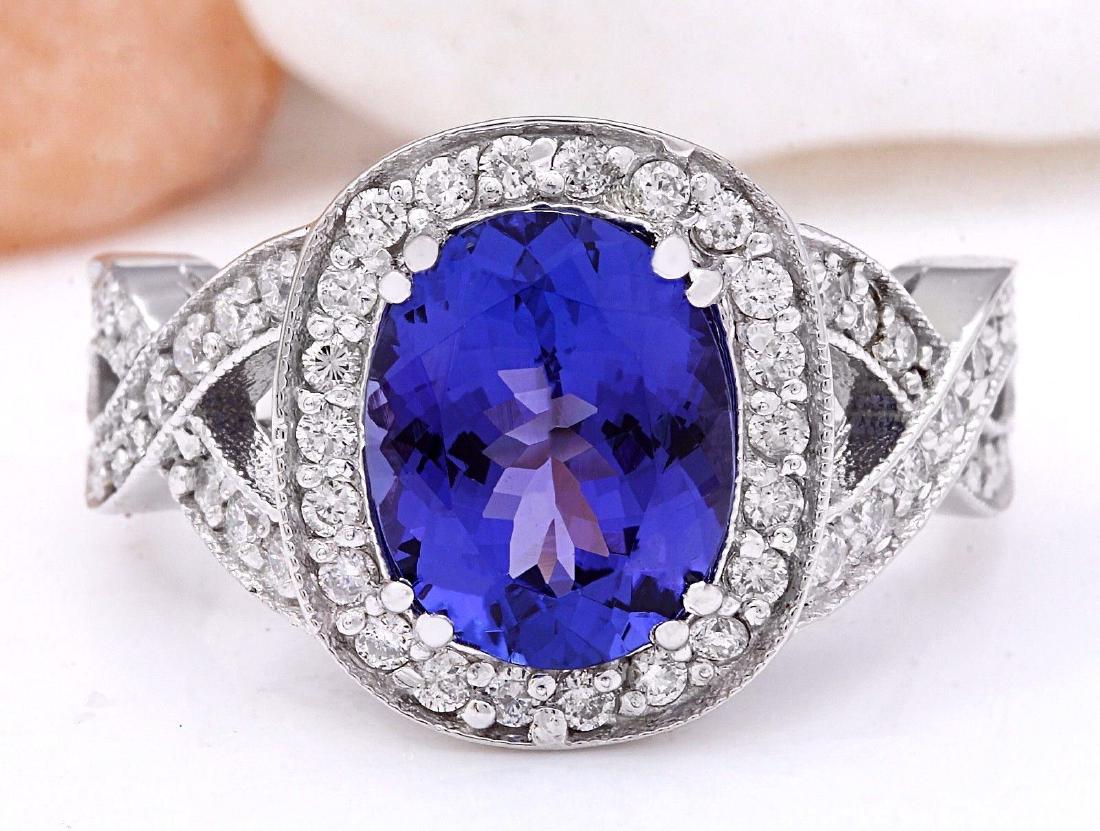 3.58 Carat Natural Tanzanite 18K Solid White Gold: 3.58 Carat Natural Tanzanite 18K Solid White Gold Diamond Ring Item Type: Ring Item Style: Engagement Material: 18K White Gold Mainstone: Tanzanite Stone Color: Blue Stone Weight: 2.80 Carat Stone Sha