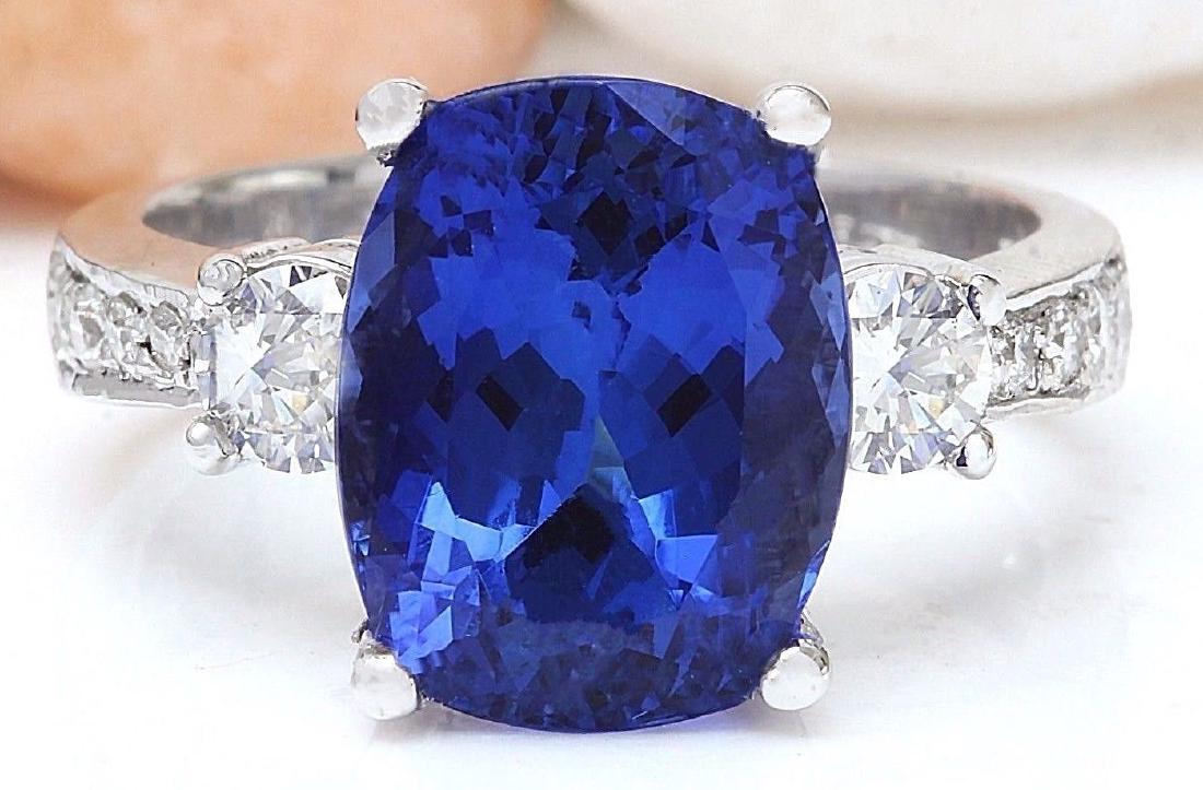 6.83 Carat Natural Tanzanite 18k Solid White Gold: 6.83 Carat Natural Tanzanite 18k Solid White Gold Diamond Ring Item Type: Ring Item Style: Engagement Material: 18k White Gold Mainstone: Tanzanite Stone Color: Blue Stone Weight: 5.83 Carat Stone Sha