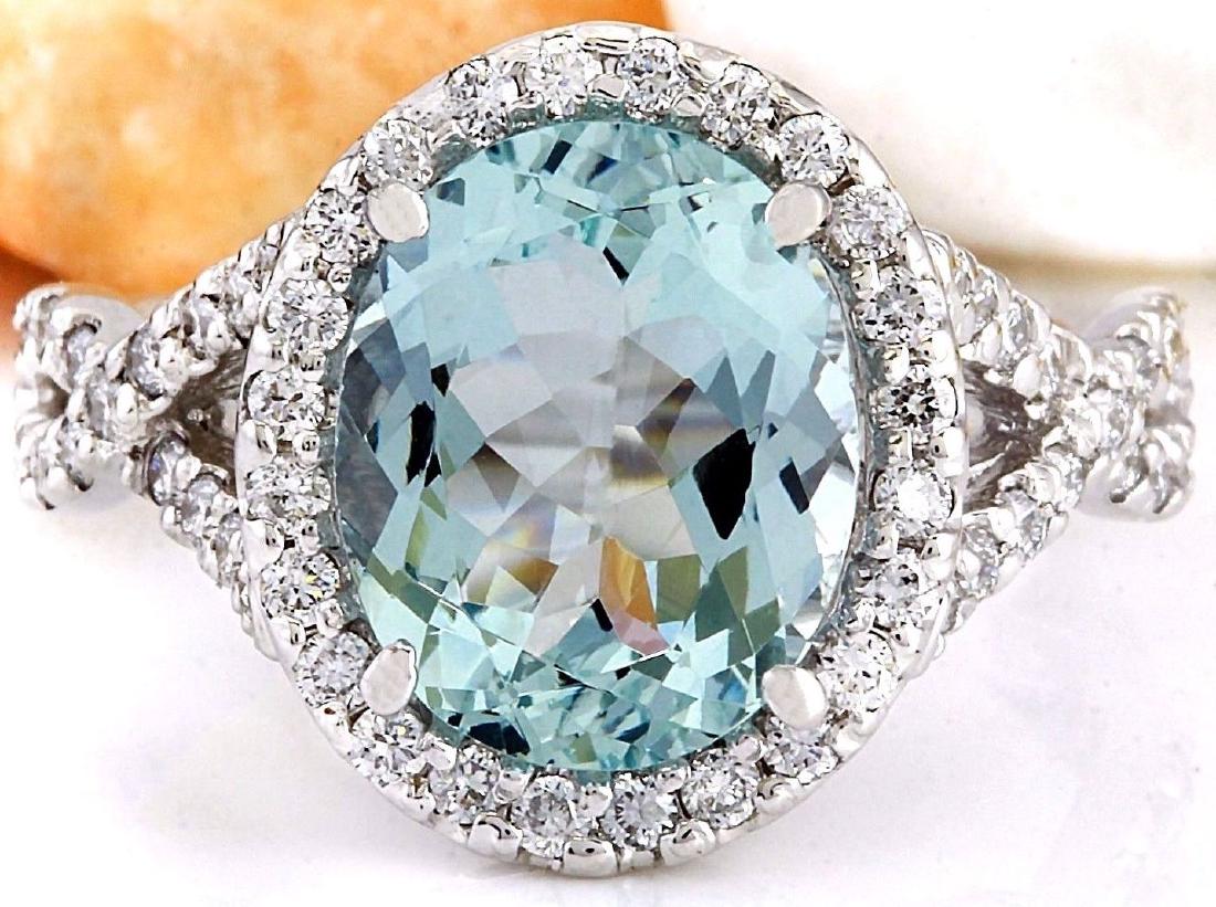 3.74 Carat Natural Aquamarine 18K Solid White Gold: 3.74 Carat Natural Aquamarine 18K Solid White Gold Diamond Ring Item Type: Ring Item Style: Cocktail Material: 18K White Gold Mainstone: Aquamarine Stone Color: Blue Stone Weight: 3.04 Carat Stone Sha